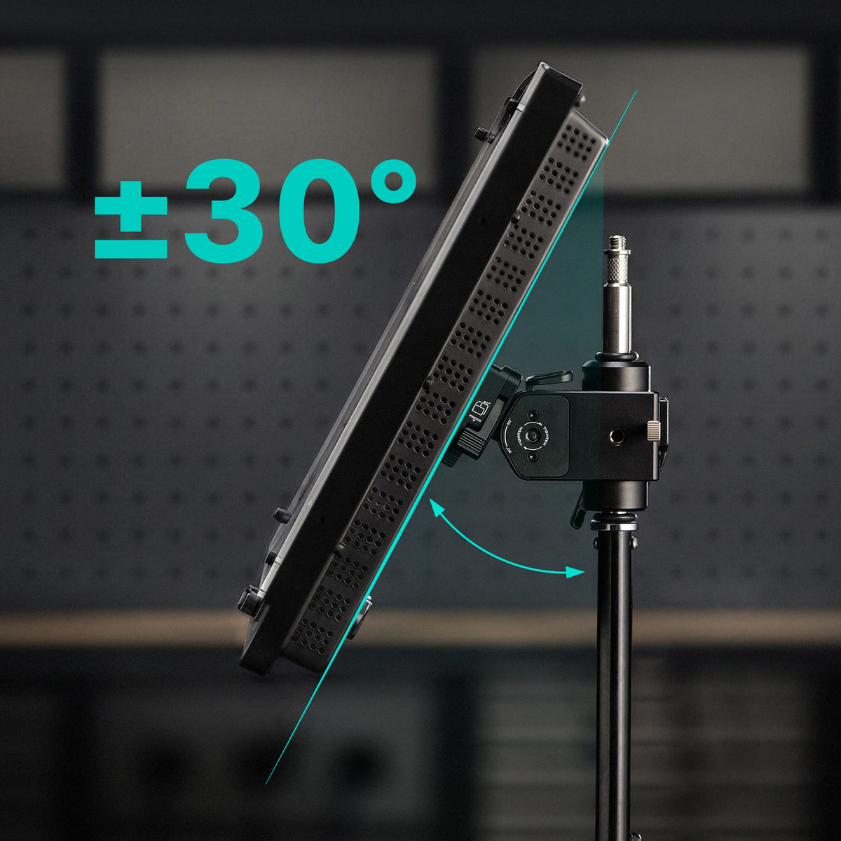 Light panel mounted on a stand, demonstrating a ±30-degree tilt adjustment range for flexible positioning